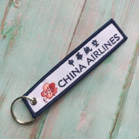 Thumbnail for China Airlines aviation Remove Before Flight key chain, aviation-tag style webbing.