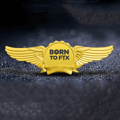 Born To Fix Airplanes aviation badge in polished metal.