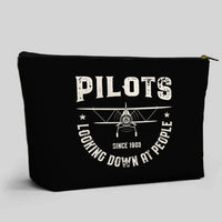 Thumbnail for Pilots Looking Down at People Since 1903 aviation design zipper pouch, durable polyester construction.