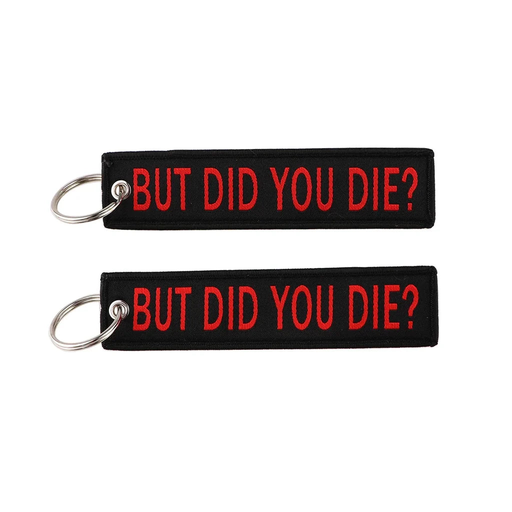 BUT DID YOU DIE? aviation fashion key chain in polished metal.