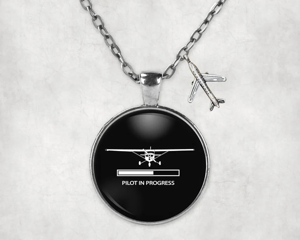 Side view of Pilot In Progress (Cessna) aviation necklace in stainless steel, polished finish.