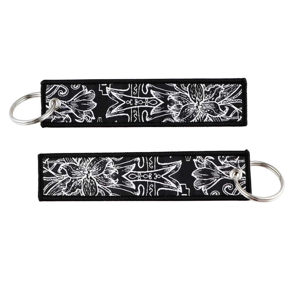 Gothic Dark Floral aviation fashion key chain in polished metal.