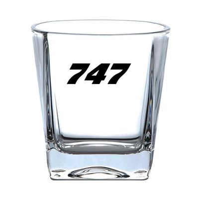 Boeing 747 Flat Text aviation design on whiskey glass, crystal-clear premium glassware.