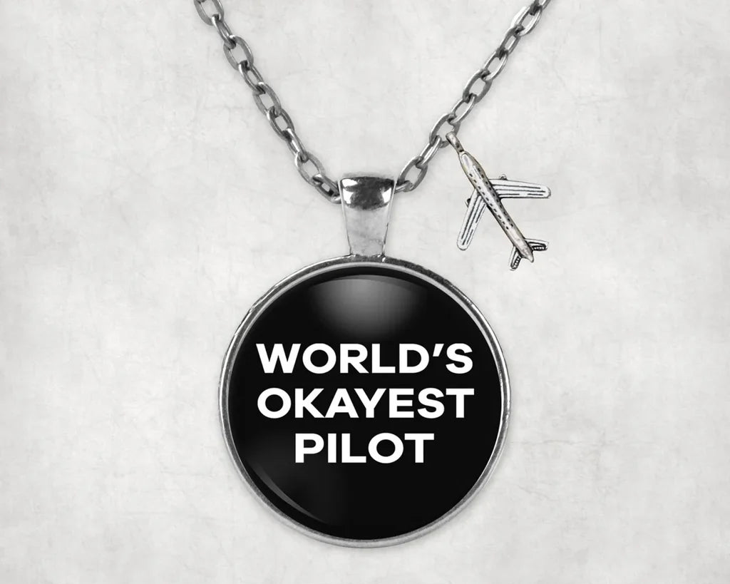 Side view of World's Okayest aviation necklace in stainless steel, polished finish.