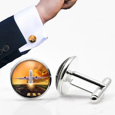 Amazing Departing Aircraft Sunset & Clouds Behind aviation cuff links, polished metal body with engraved detail.