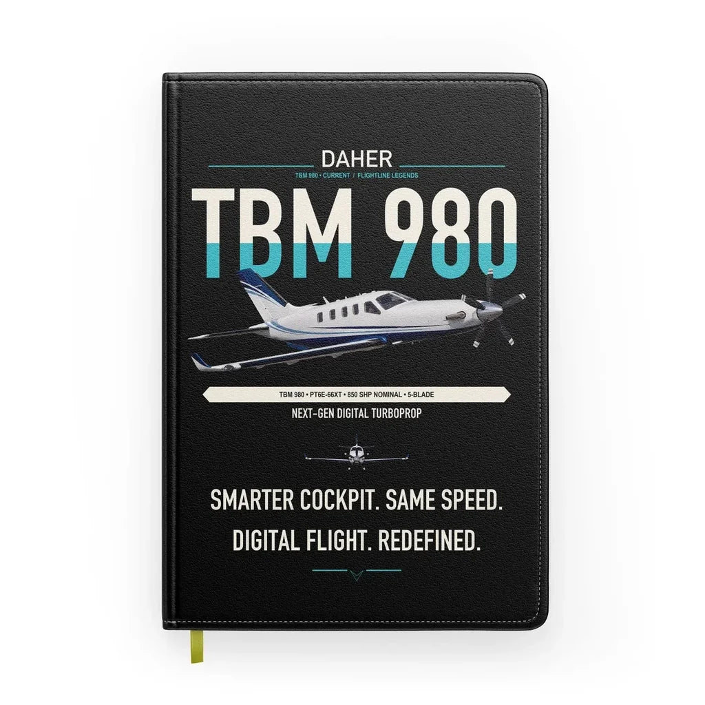 Daher TBM 980 design on black notebook