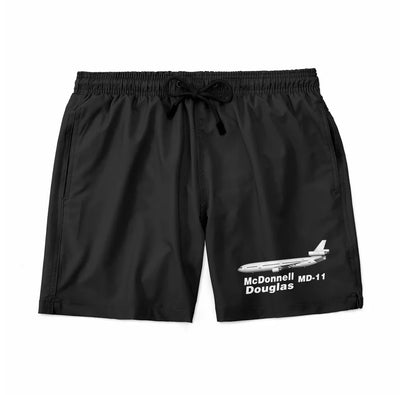 The McDonnell Douglas MD-11 aviation design on quick-dry polyester swim trunks.
