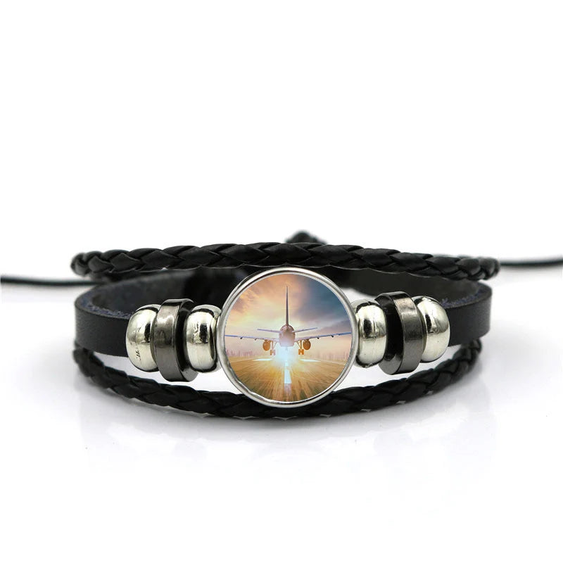 Airplane Flying Over Runway aviation bracelet, stainless steel body with engraved detail.