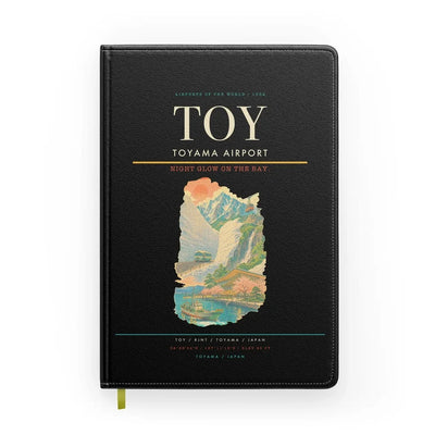 Toyama Airport (TOY) design on black notebook