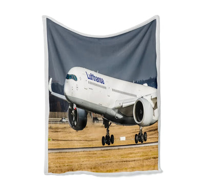 Lufthansa's A350 Bed Blankets & aviation print on soft fleece blanket.