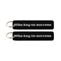 Thumbnail for The Key to Success aviation fashion key chain in polished metal.