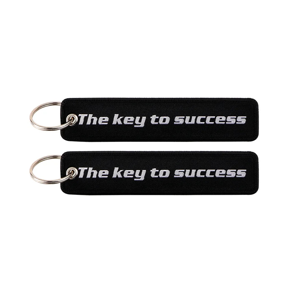 The Key to Success aviation fashion key chain in polished metal.