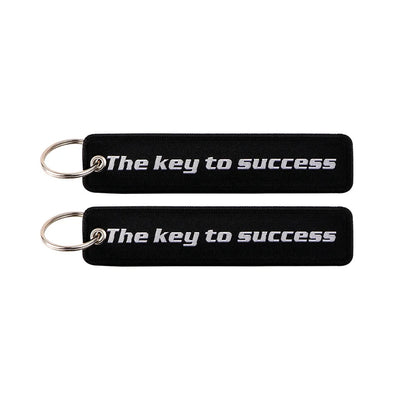 The Key to Success aviation fashion key chain in polished metal.