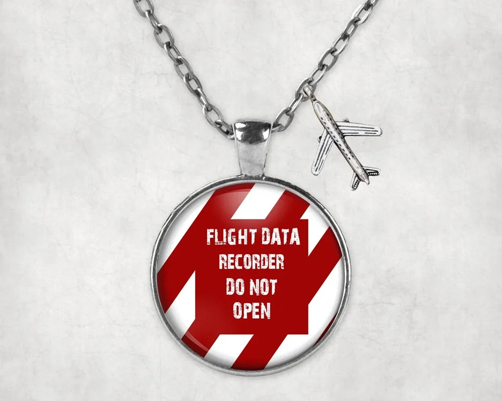 Side view of Flight Data Recorder - Do Not Open aviation necklace in stainless steel, polished finish.