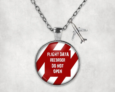 Side view of Flight Data Recorder - Do Not Open aviation necklace in stainless steel, polished finish.