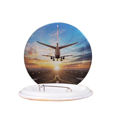 Airplane over Runway Towards the Sunrise aviation design pin in polished enamel.