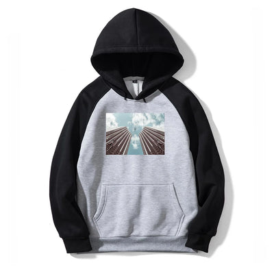 Airplane over Runway Towards the Hoodie