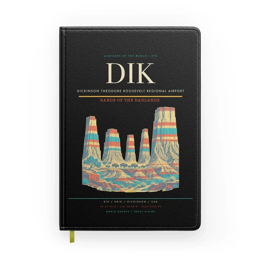 Dickinson Theodore Roosevelt Regional Airport (DIK) design on black notebook