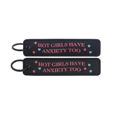 HOT GIRLS HAVE ANXIETY TOO aviation fashion key chain in polished metal.