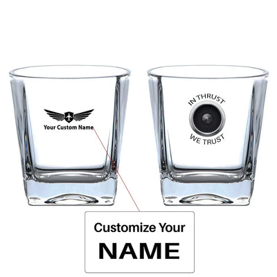 In Thrust We Trust aviation design on whiskey glass, crystal-clear premium glassware.