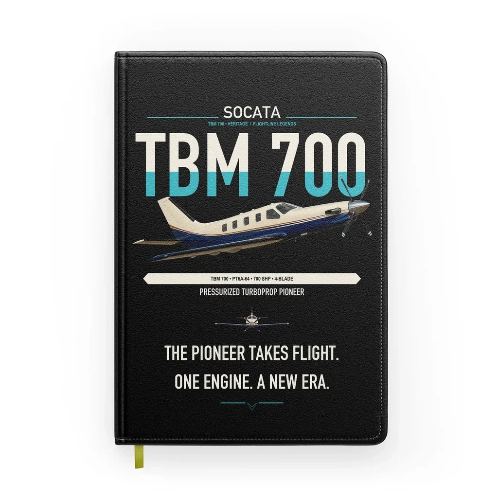 Socata TBM 700 design on black notebook