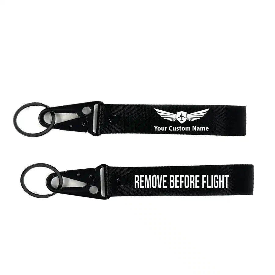 Remove Before Flight 2 aviation hawk-shaped key chain, durable metal alloy.