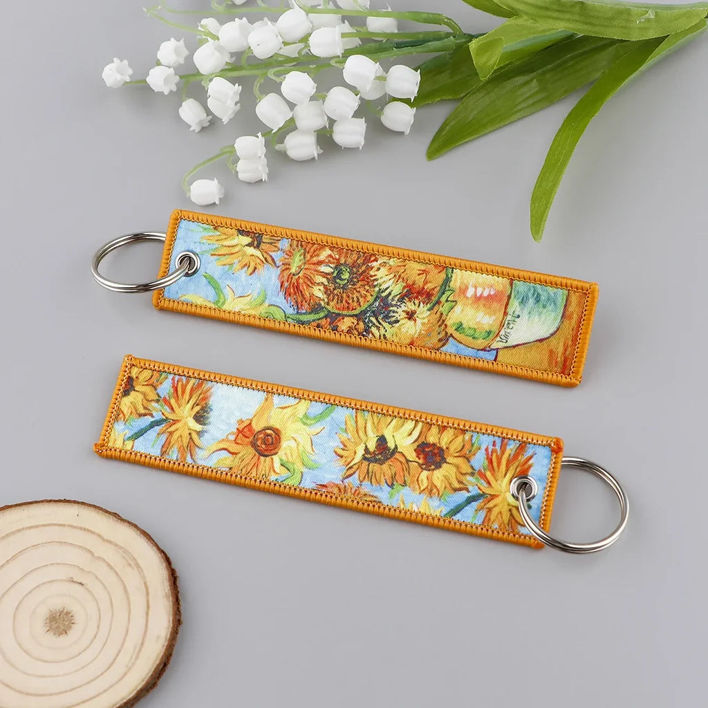 Sunflowers aviation fashion key chain in polished metal.