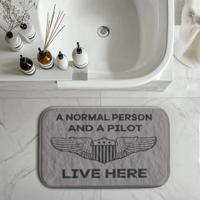 A Normal Person and A PILOT Live Here aviation print bath mat, soft absorbent fabric with non-slip backing.