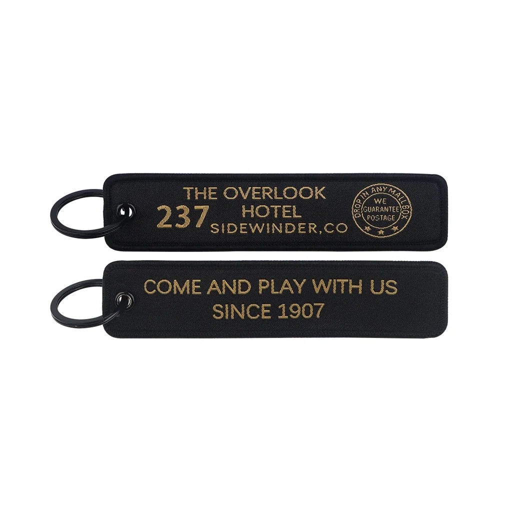 The Shining aviation fashion key chain in polished metal.