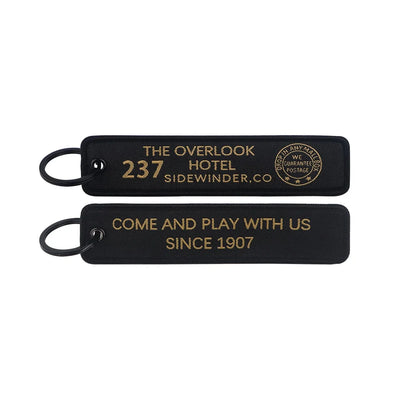 The Shining aviation fashion key chain in polished metal.