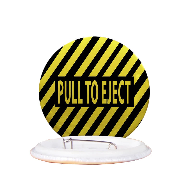 Pull to Eject aviation design pin in polished enamel.
