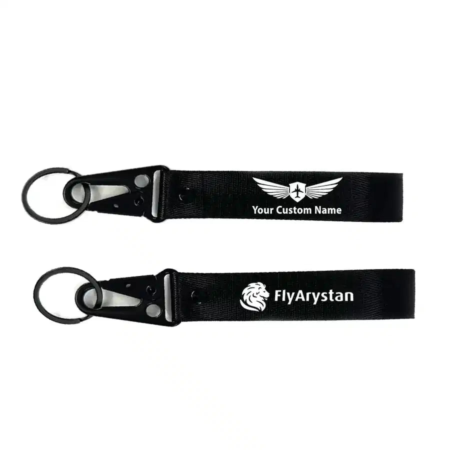 FlyArystan Airlines aviation hawk-shaped key chain, durable metal alloy.