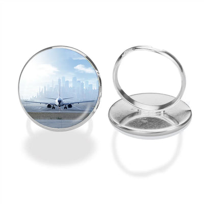 Boeing 737 & City View Behind aviation ring in stainless steel.