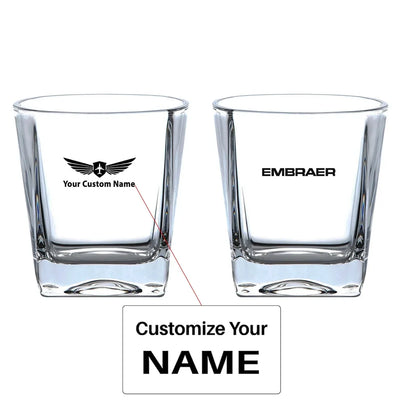 Embraer & Text aviation design on whiskey glass, crystal-clear premium glassware.