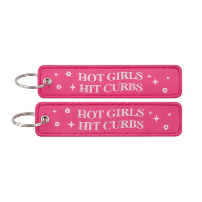 HOT GIRLS HIT CURBS aviation fashion key chain in polished metal.