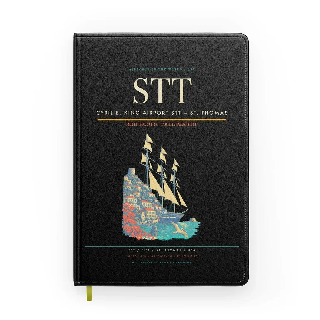 Cyril E. King Airport (STT) design on black notebook