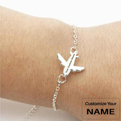 Side view of Airplane Shaped Beautiful aviation bracelet in polished metal, polished finish.