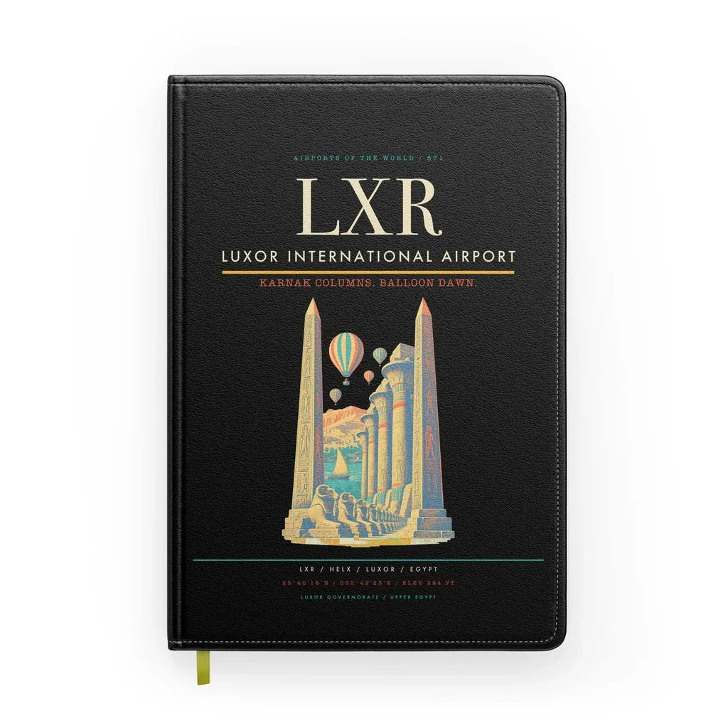Luxor International Airport (LXR) design on black notebook