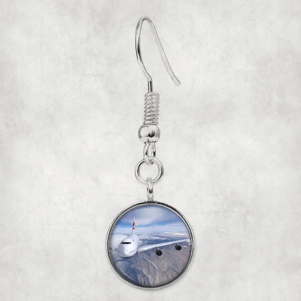Graphical Boeing 747 aviation earrings, hypoallergenic alloy body with engraved detail.
