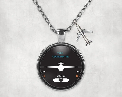 Turn Coordinator aviation-themed necklace, polished stainless steel.