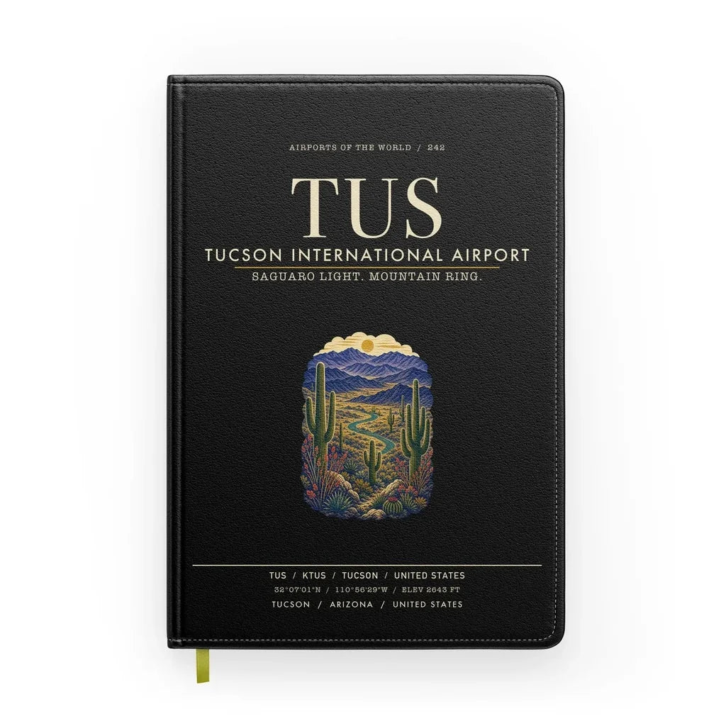 Tucson International Airport (TUS) design on black notebook