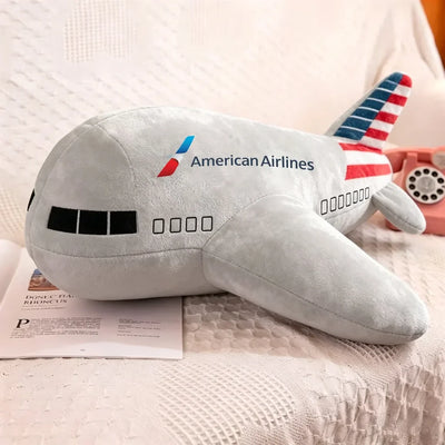 AA aviation design on soft polyester filling airplane-shape decorative pillow.