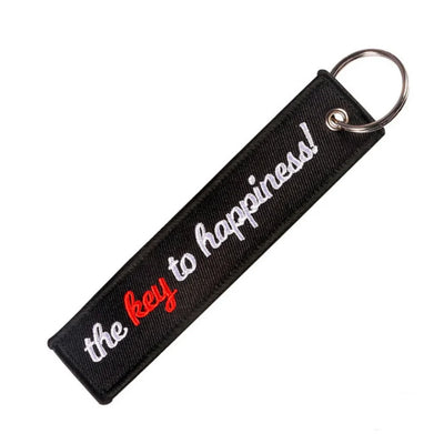 The key to Happiness aviation fashion key chain in polished metal.