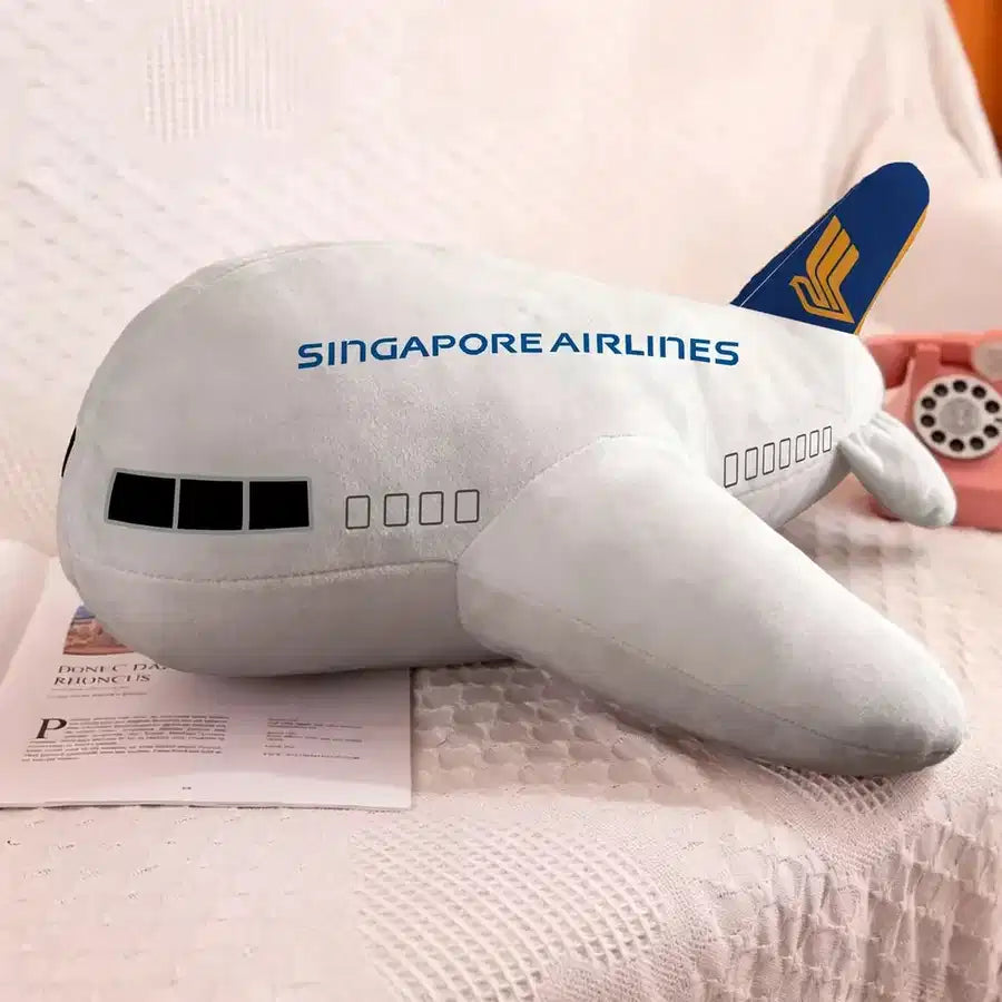 Singapore Airlines aviation design on soft polyester filling airplane-shape decorative pillow.