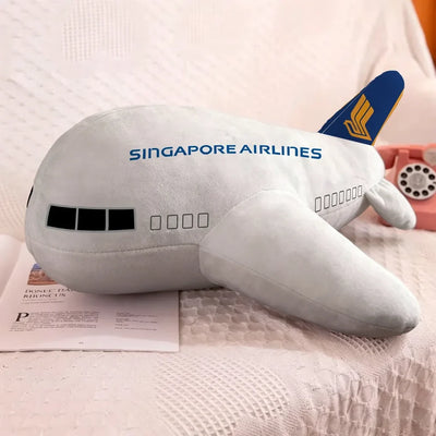 Singapore Airlines aviation design on soft polyester filling airplane-shape decorative pillow.