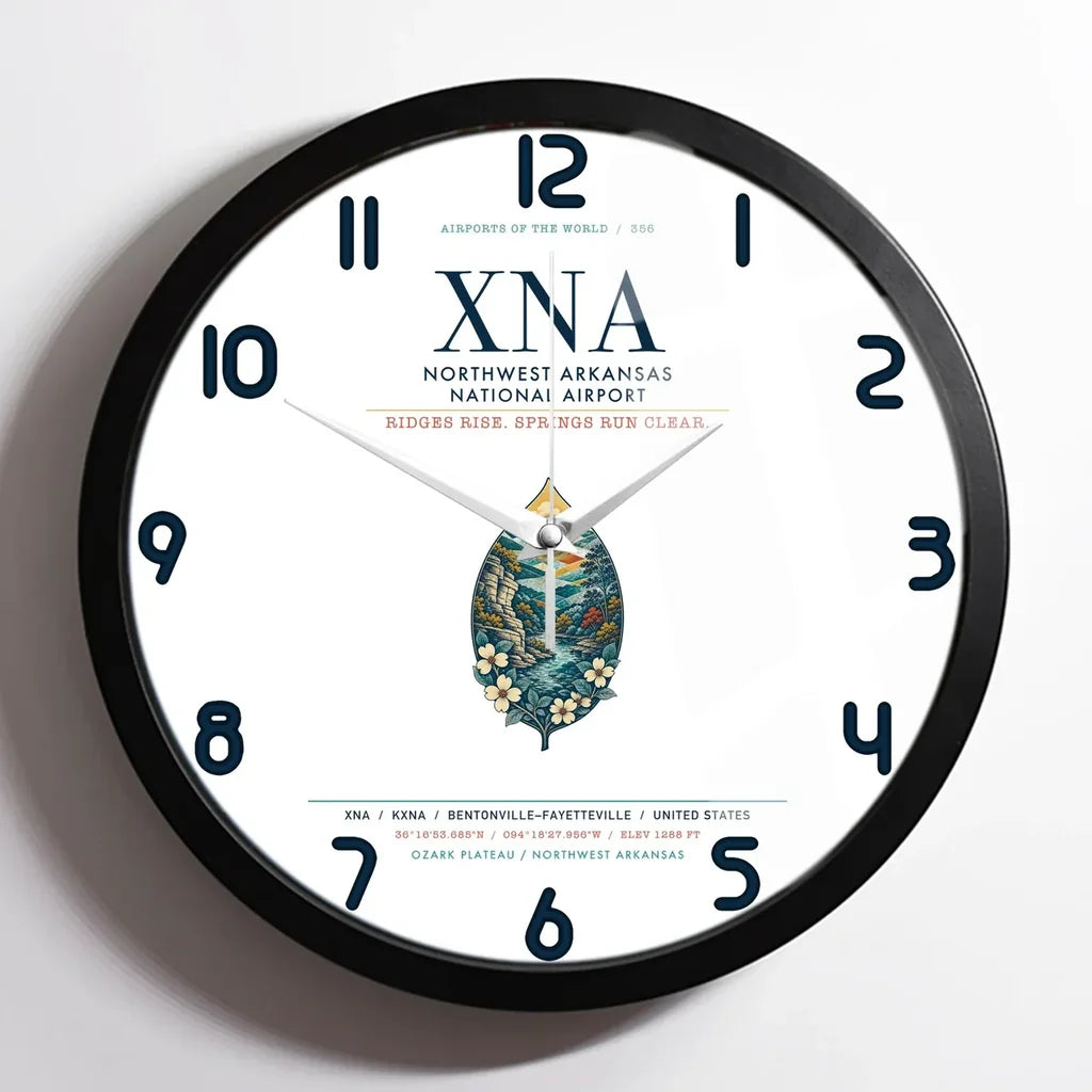 Northwest Arkansas National Airport (XNA) design on white framed wall clock