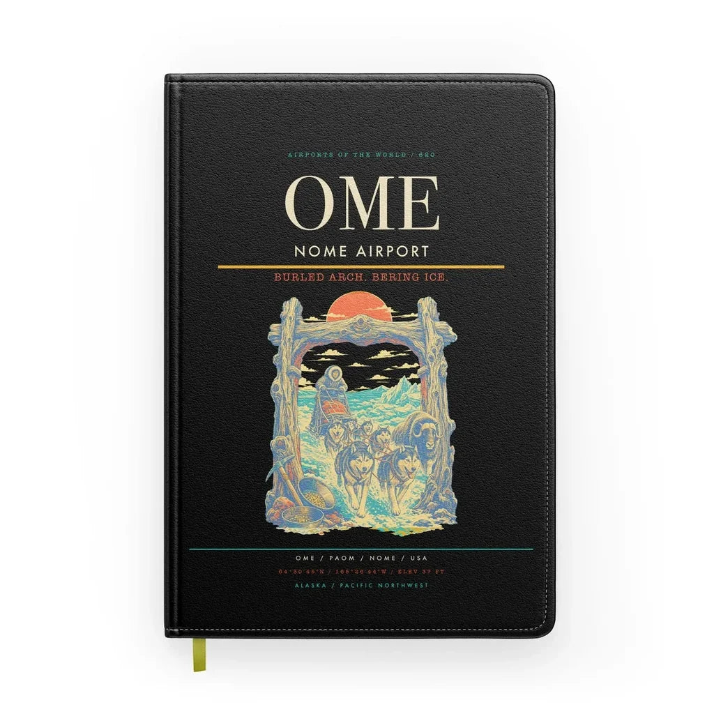 Nome Airport (OME) design on black notebook