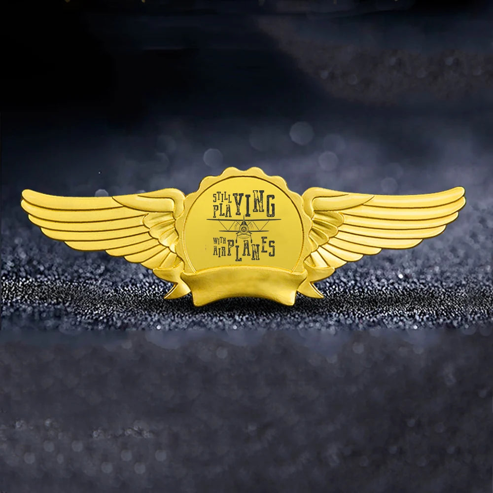 Still Playing With Airplanes aviation badge in polished metal.