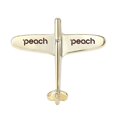 Side view of Peach Airlines Airplane Shape aviation airplane-shape brooch in polished alloy, polished finish.