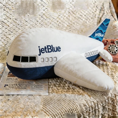 Jetblue Airways aviation design on soft polyester filling airplane-shape decorative pillow.